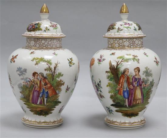 A pair of Dresden gilt and figurative vases